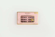 Load image into Gallery viewer, Noura Angel Wings lash clusters in a pink-and-gold presentation box